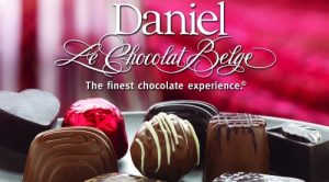 The words "Daniel Le Chocolat Belge" and a variety of chocolates.