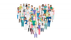 A team of medical professionals standing in a heart shape