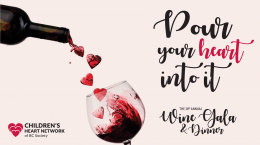 A wine bottle pours hearts into a wine glass beside the text "Pour your heart into it"